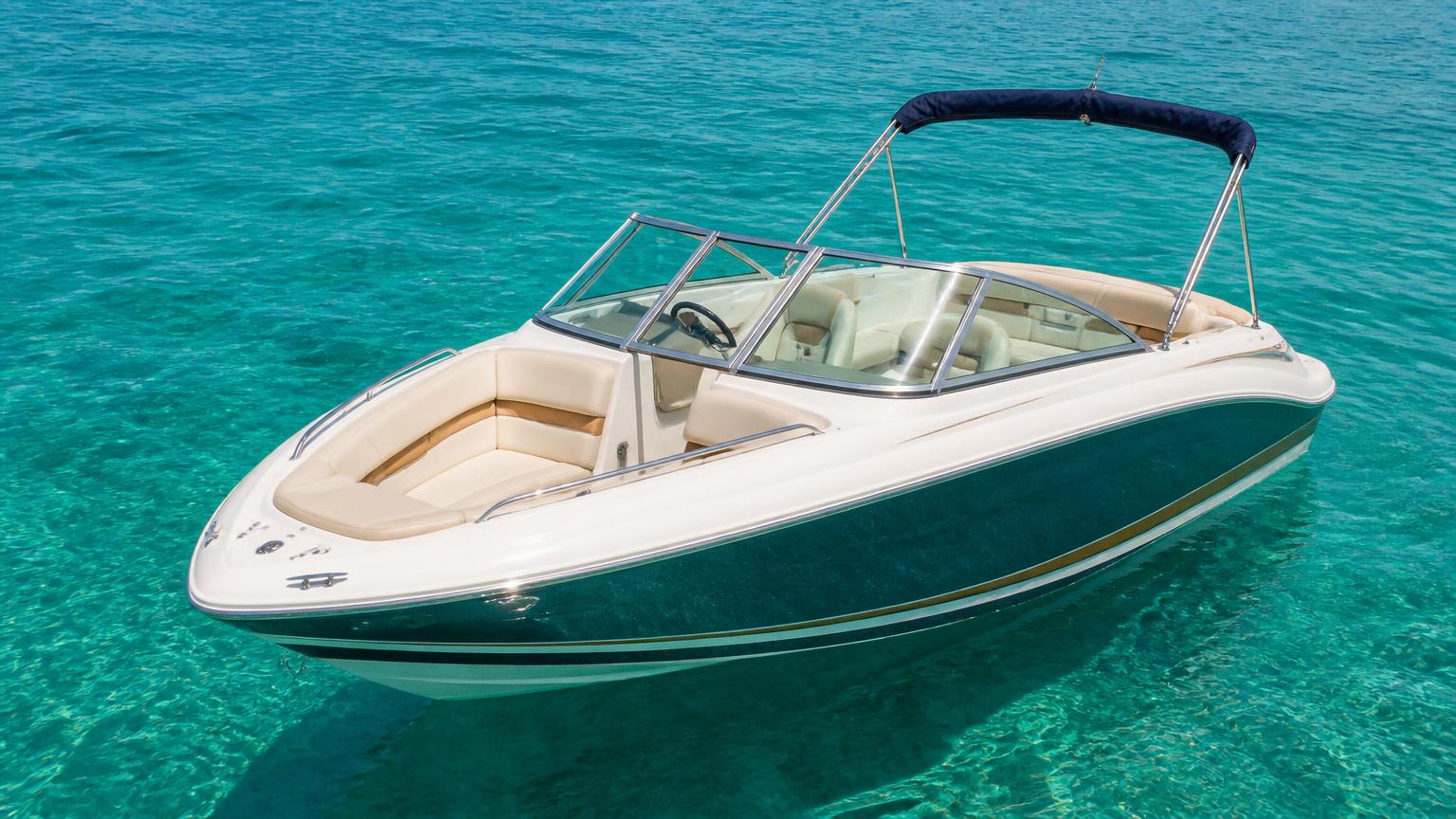 Bayliner 195 Bowrider Amazing Photo by www.BOWRIDER-BOATS.com — Bayliner 195 bowrider cruising on clear blue water. Images Created by www.Bowrider-Boats.com